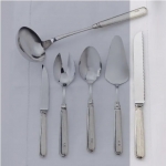 Inglese Pewter Cake/Bread Knife Care & Use:  Dishwasher safe, low heat, scent-free liquid detergent.
